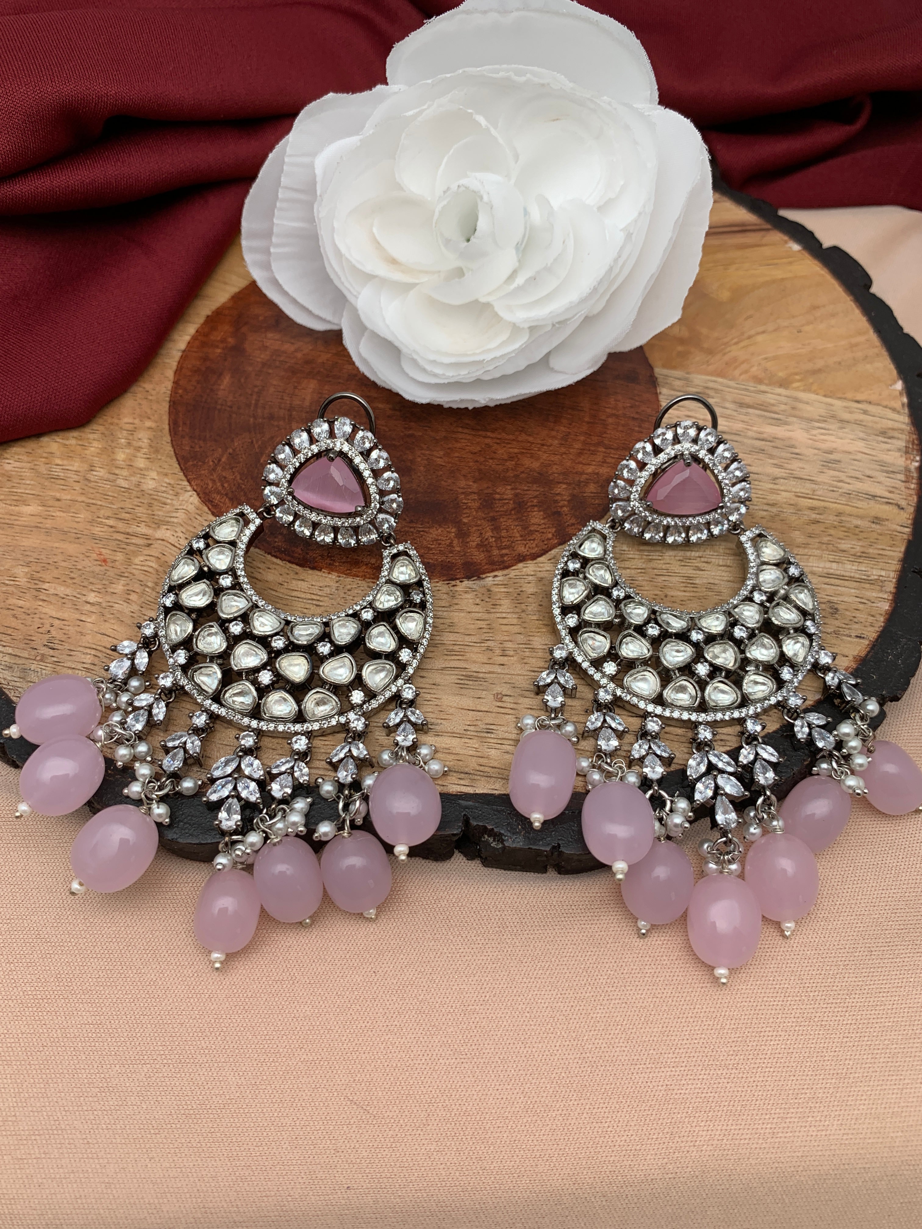pink color jhumki earrings for women
